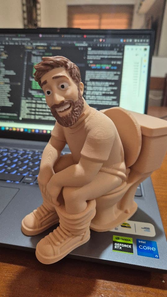 Boneco cagão
